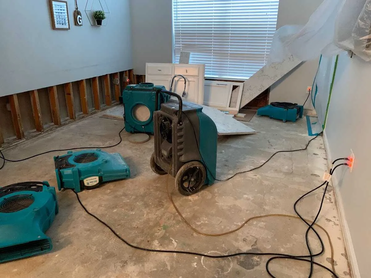 Dehumidifier in flood-cut room for Water Damage Restoration in Fort Scott